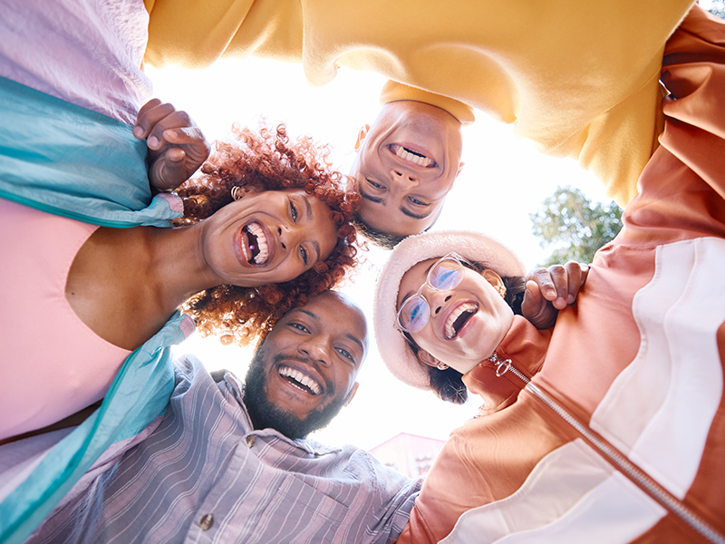 Diverse group of people smiling together